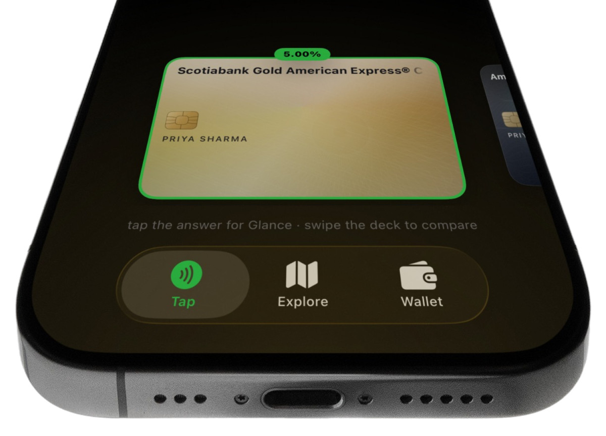 An iPhone seen from below, showing Yoho's Tap screen with the winning card outlined in green